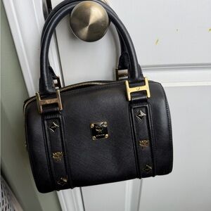 MCM Black Satchel with Gold Accents